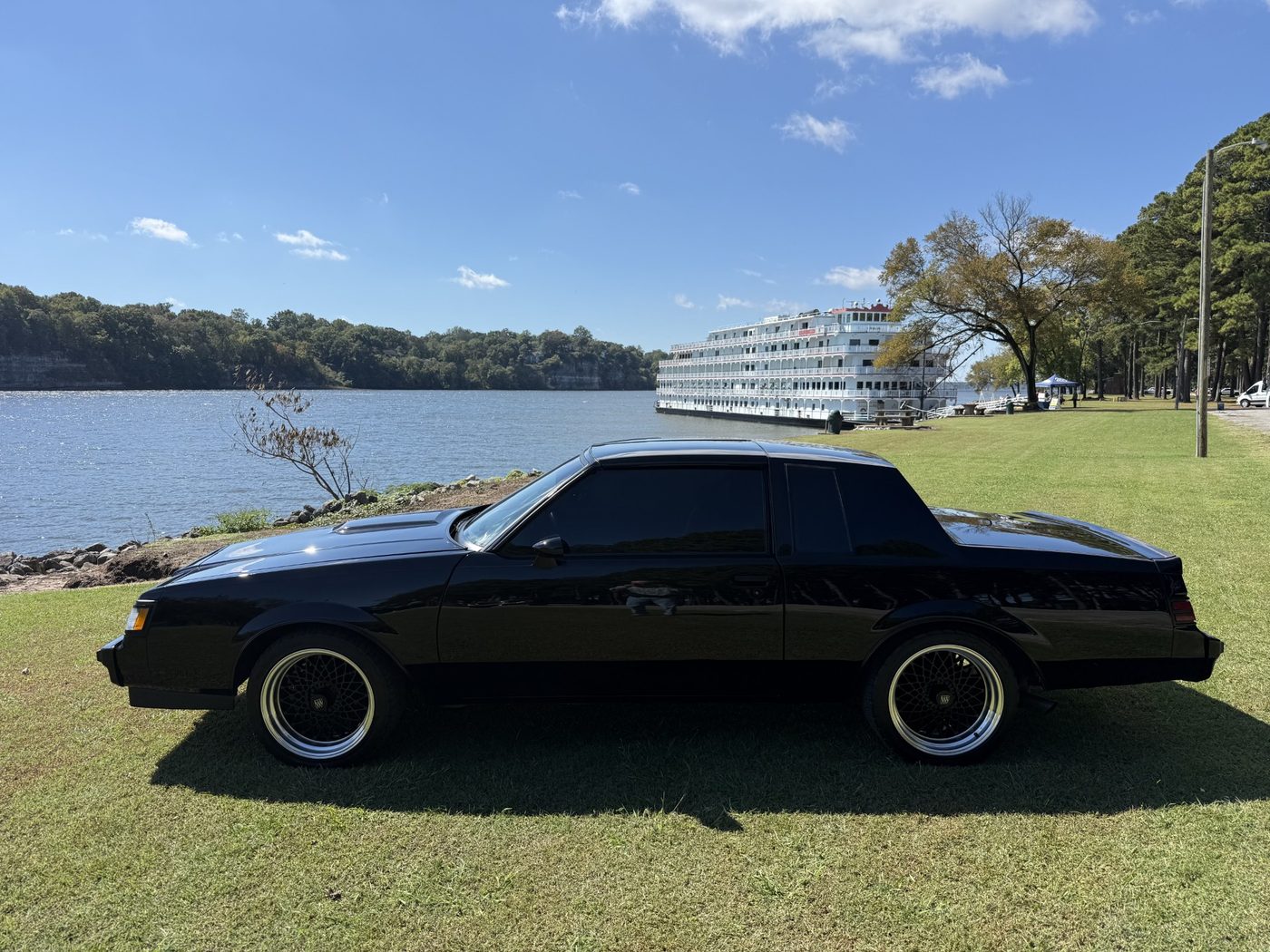 John Killen's classic car parked on the bank of the Tennessee River in the Shoals